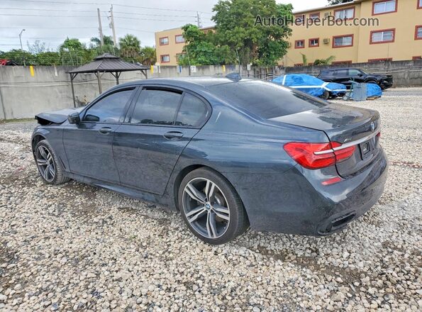 WBA7B0C53GG526850 2016 BMW 7 SERIES Gray Trasero izquierdo