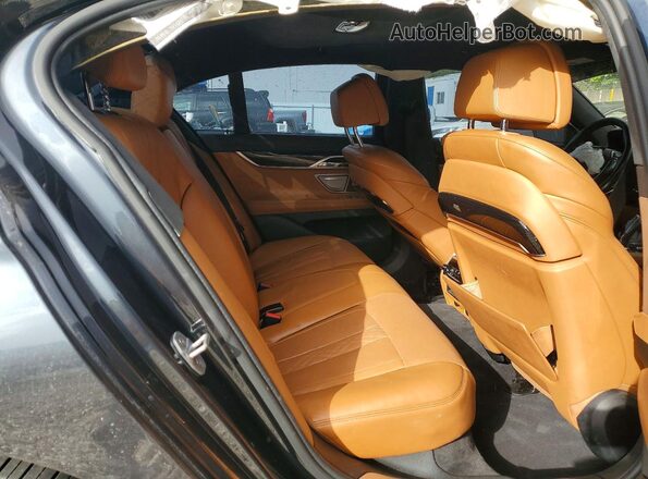 WBA7B0C53GG526850 2016 BMW 7 SERIES Gray Vista de los asientos traseros