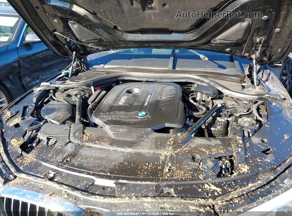 WBA7E2C57HG740096 2017 BMW 7 SERIES Black Вид ззаду