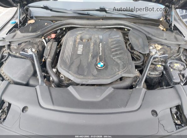 WBA7E2C5XGG738468 2016 BMW 7 SERIES Серый Вид сзади
