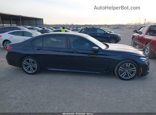 WBA7F0C52JGM22930 2018 BMW 7 SERIES Black Vista interior trasera