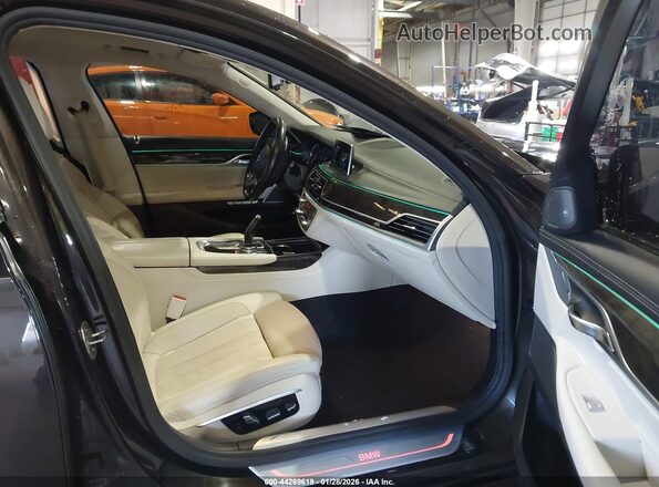 WBA7F2C5XGG418385 2016 BMW 7 SERIES Gray Vista interior delantera