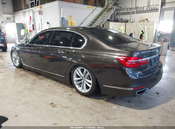 WBA7F2C5XGG418385 2016 BMW 7 SERIES Gray Trasero izquierdo