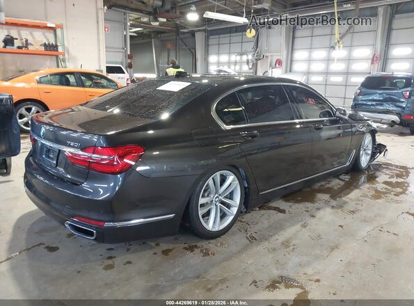 WBA7F2C5XGG418385 2016 BMW 7 SERIES Gray Trasero derecho