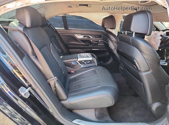 WBA7H6C31HG614426 2017 BMW M6 Blue Vista de los asientos traseros