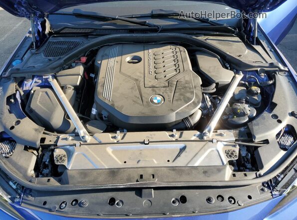 WBA83AP00NCJ94053 2022 BMW M4 Blue Vista interior trasera