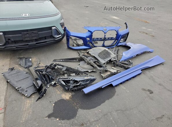 WBA83AP02PCM02193 2023 BMW M4 Blue Vista del compartimento del motor