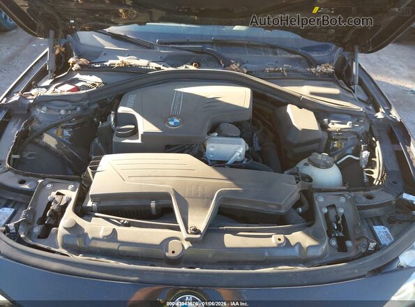 WBA8A3C58JA491760 2018 BMW 3 SERIES Black Rear view