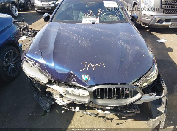 WBABC4C06PCL86707 2023 BMW M8 Blue Հետևի տեսք