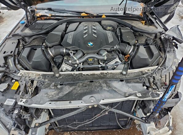 WBABC4C54KBU96102 2019 BMW M8 Black Vista interior trasera