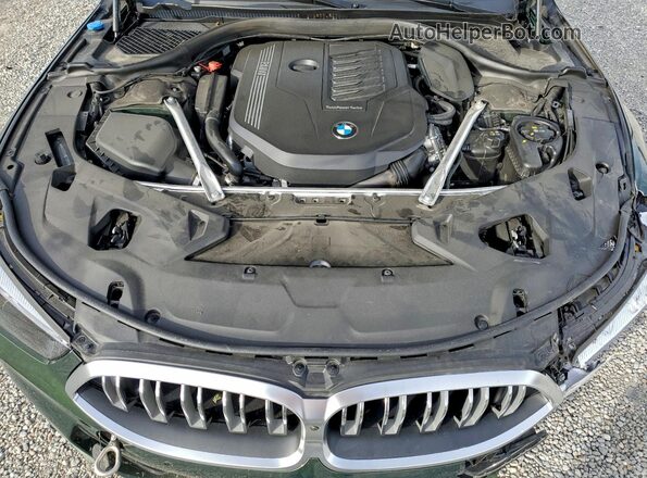 WBADZ2C0XSCT29172 2025 BMW 8 SERIES Green Вид задньої частини салону