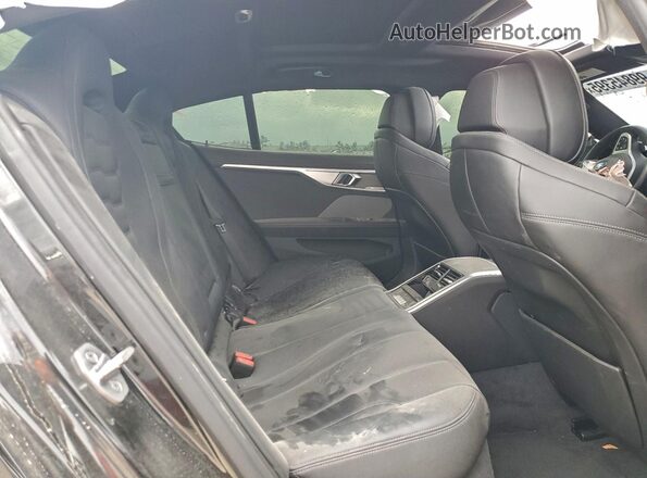 WBAGV2C04MCF18902 2021 BMW 8 SERIES Black Widok tylnych siedzeń