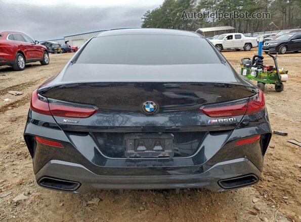 WBAGV8C04NCH67611 2022 BMW M8 Black Vista trasera