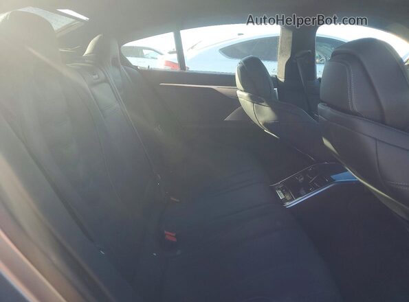 WBAGV8C04SCU26668 2025 BMW M8 Silver Rear seats view