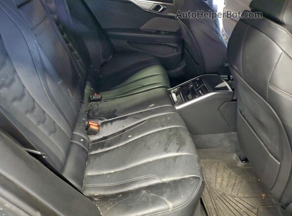 WBAGV8C06NCH89965 2022 BMW M8 Black Rear seats view