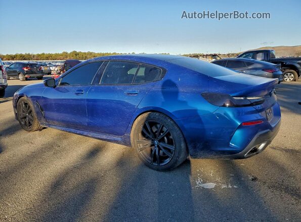 WBAGV8C07LCE44957 2020 BMW M8 Blue Trasero izquierdo