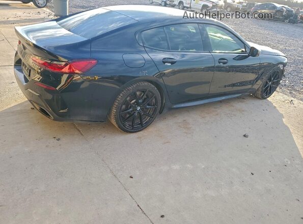 WBAGV8C09LCD81814 2020 BMW M8 Black Tył prawy