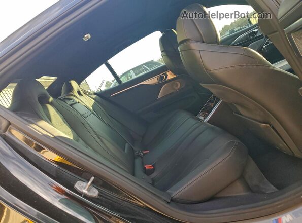 WBAGV8C09LCD81814 2020 BMW M8 Black Widok tylnych siedzeń