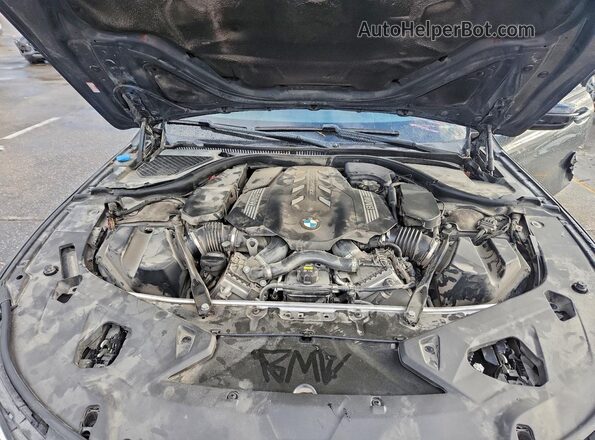 WBAGV8C09MCF86664 2021 BMW M8 Charcoal Вид задньої частини салону