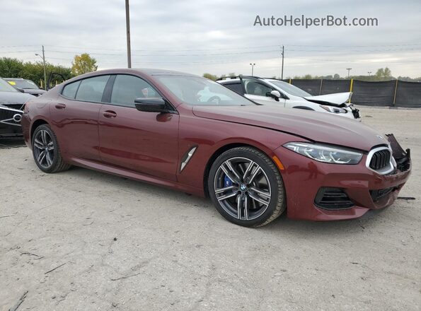 WBAGV8C0XSCT85219 2025 BMW M8 Burgundy Przód prawy