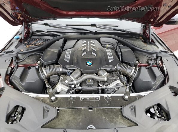 WBAGV8C0XSCT85219 2025 BMW M8 Burgundy Widok wnętrza z tyłu