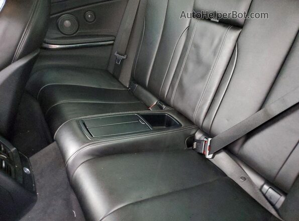 WBS4Z9C55JED22586 2018 BMW M4 White Rear seats view