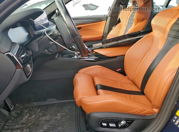 WBS83CH04PCN22583 2023 BMW M5 Blue Vista interior delantera