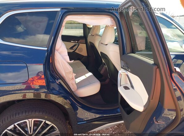 WBX73EF03T5488140 2026 BMW X1 Blue Вид наклейки з VIN-кодом