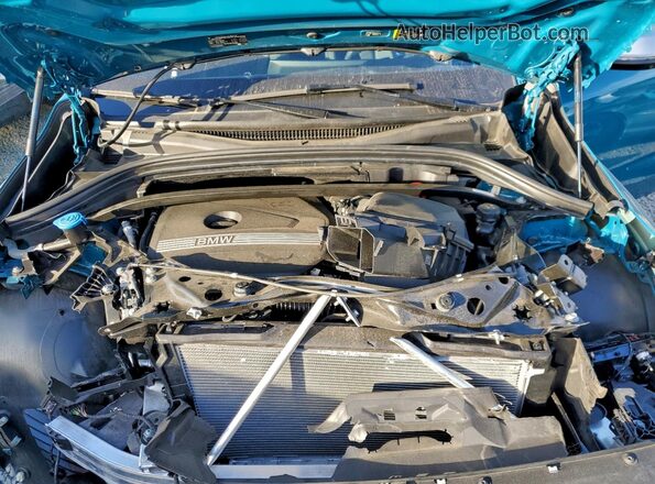 WBX73EF0XP5X09898 2023 BMW X1 Teal ძრავის განყოფილების ხედი