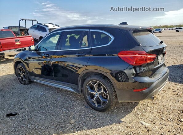 WBXHT3C30GP881823 2016 BMW X1 Black Trasero izquierdo