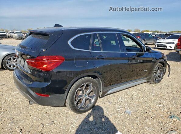 WBXHT3C30GP881823 2016 BMW X1 Black Trasero derecho