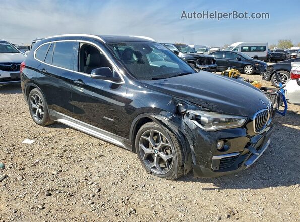 WBXHT3C30GP881823 2016 BMW X1 Black Delantero derecho