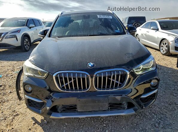 WBXHT3C30GP881823 2016 BMW X1 Black Vista frontal