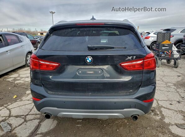 WBXHT3C35GP889030 2016 BMW X1 Черный Вид сзади