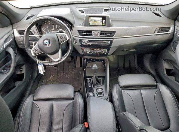 WBXHT3C35GP889030 2016 BMW X1 Черный Вид панели приборов