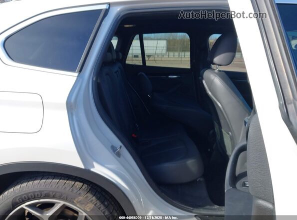 WBXHT3C39J5K29771 2018 BMW X1 White VIN sticker view