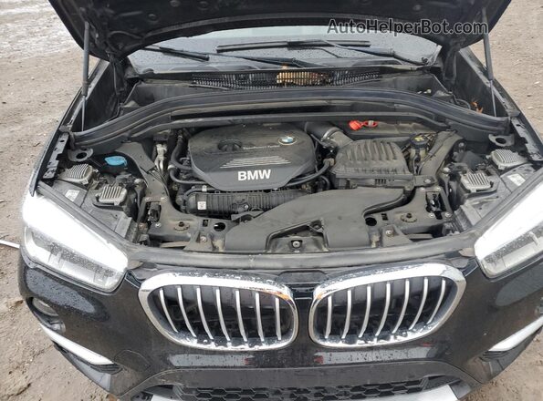 WBXHT3C39J5L27831 2018 BMW X1 Black Вид підкапотного простору