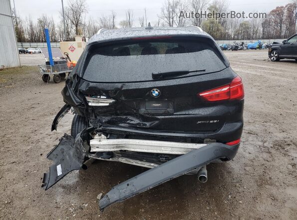 WBXHT3C39J5L27831 2018 BMW X1 Black Вид ззаду