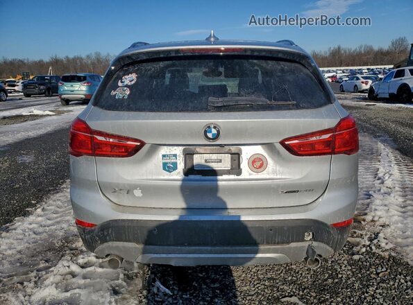 WBXHT3C53K5L38455 2019 BMW X1 Silver Rear view
