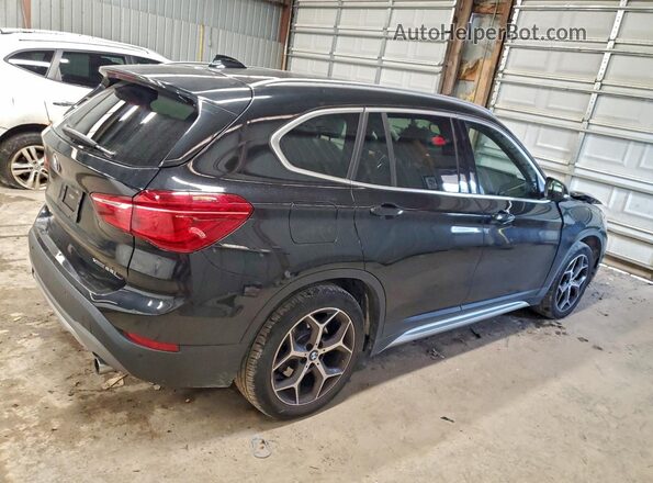 WBXHT3C54K3H35378 2019 BMW X1 Black 