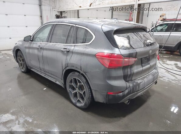 WBXHT3Z36G4A49933 2016 BMW X1 Gray Rear left