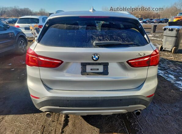 WBXHT3Z37H4A65284 2017 BMW X1 Silver Вид ззаду