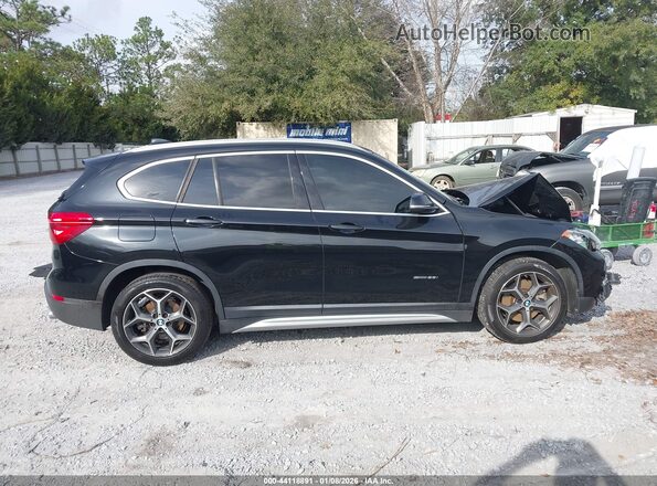 WBXHU7C38J5H45904 2018 BMW X1 Black Rear interior view
