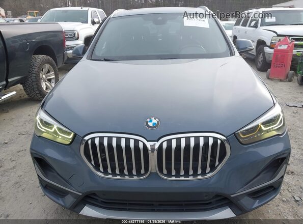 WBXJG7C07L3L85650 2020 BMW X1 Gray Սարքավորումների վահանակի տեսք