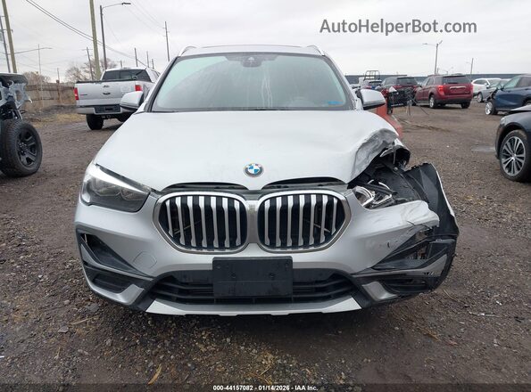 WBXJG9C06L5P79527 2020 BMW X1 Silver ხელსაწყოთა პანელის ხედი
