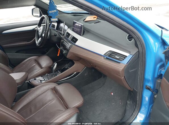 WBXJG9C06M5T32097 2021 BMW X1 Blue Սալոնի դիմացի տեսք