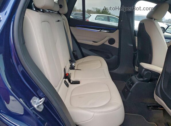 WBXJG9C09L5P77755 2020 BMW X1 Синий Вид задней части салона