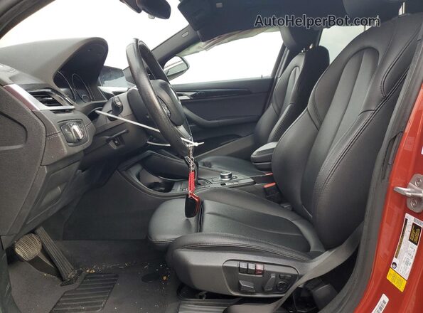 WBXYH9C05L5P36132 2020 BMW X2 Maroon Vista interior delantera