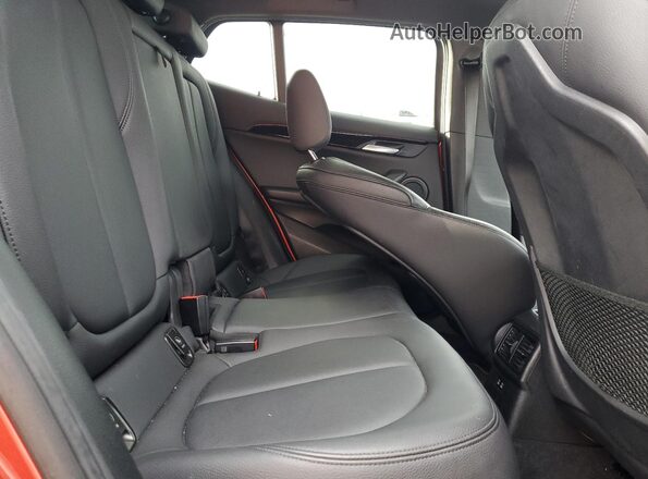 WBXYH9C05L5P36132 2020 BMW X2 Maroon Vista interior trasera