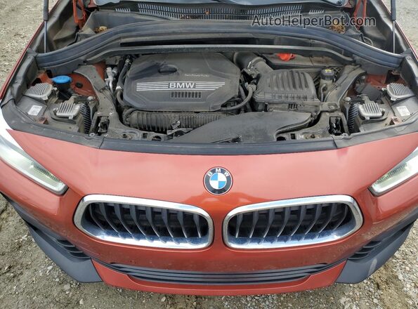 WBXYH9C05L5P36132 2020 BMW X2 Maroon Vista del compartimento del motor